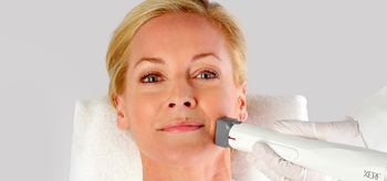Woman receiving Olivia Quido Xerf Facial Treatment at O Skin Spa