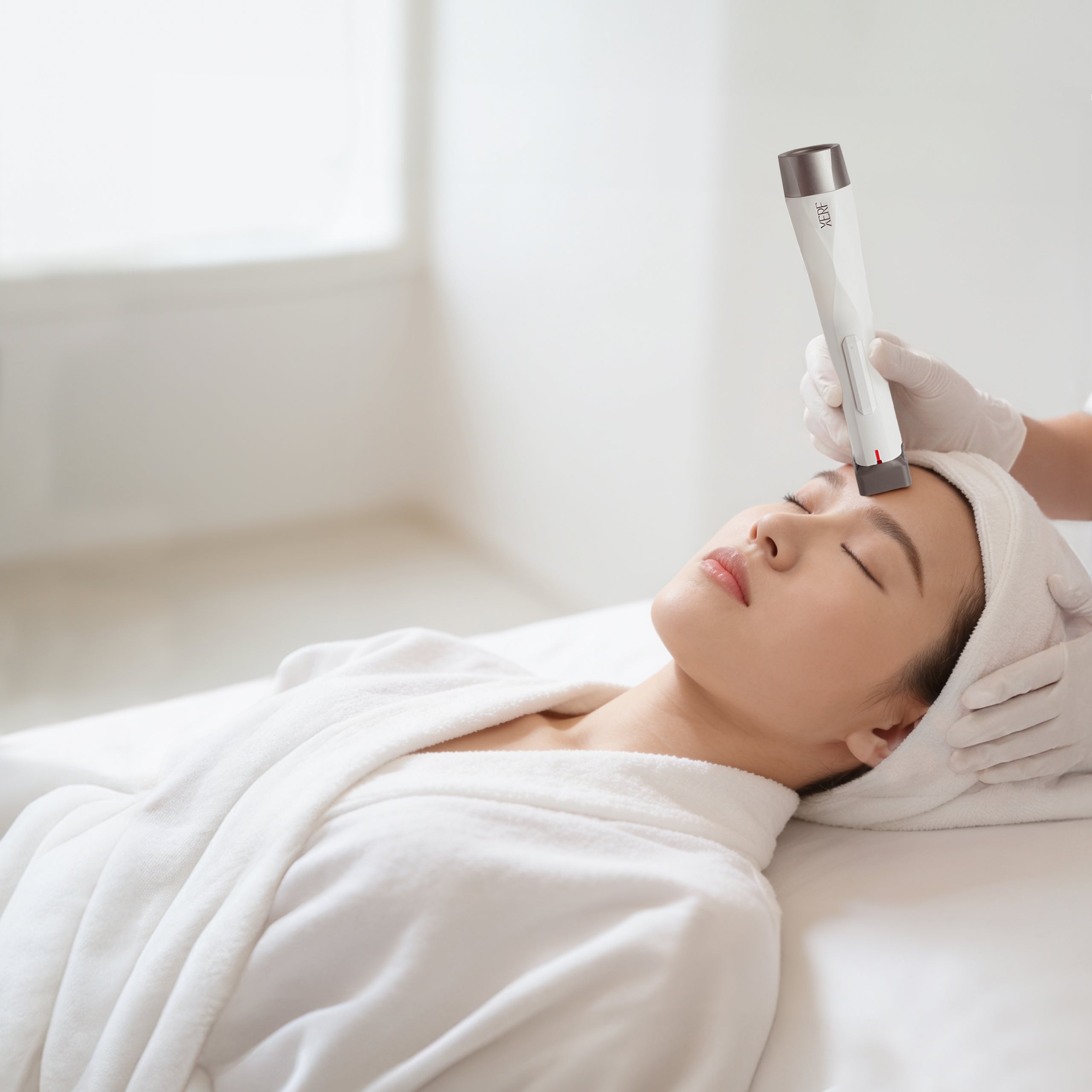 Woman receiving  Olivia Quido Xerf Facial Treatment at Olivia Quido O Skin Spa