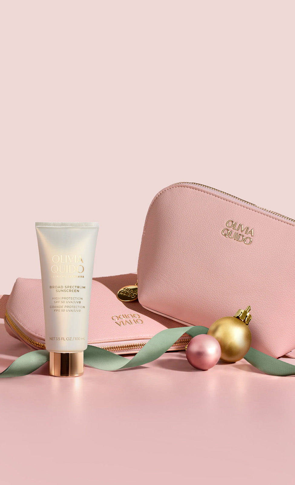 Olivia Quido Skincare Broad Spectrum Sunscreen SPF 50 and Pink Cosmetic Bag