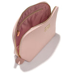 Olivia Quido Faux Leather Dome Cosmetic Bag showing the interior design in soft pink color.