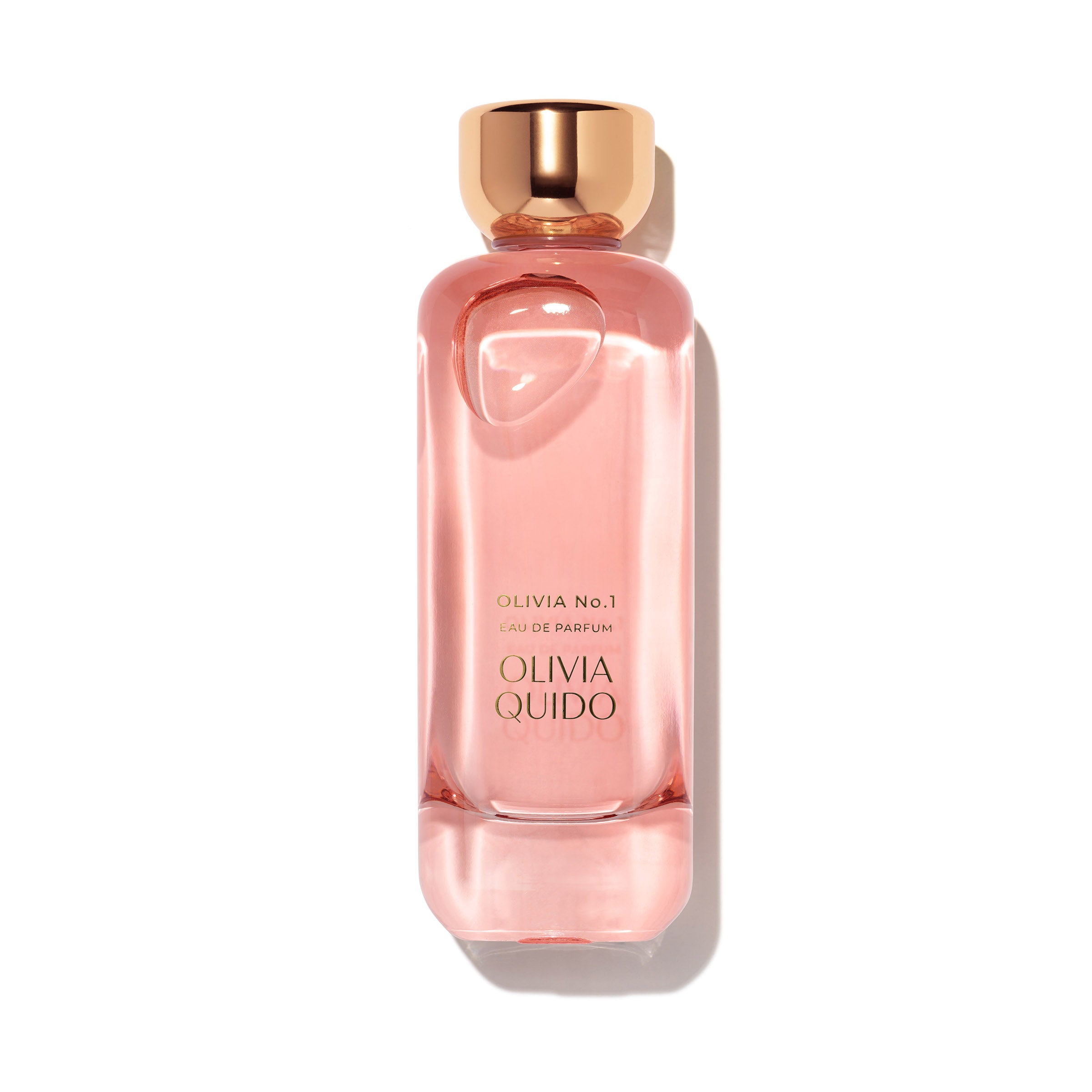 Olivia No.1 Eau de Parfum bottle featuring a sleek design with a golden cap and pink fragrance.