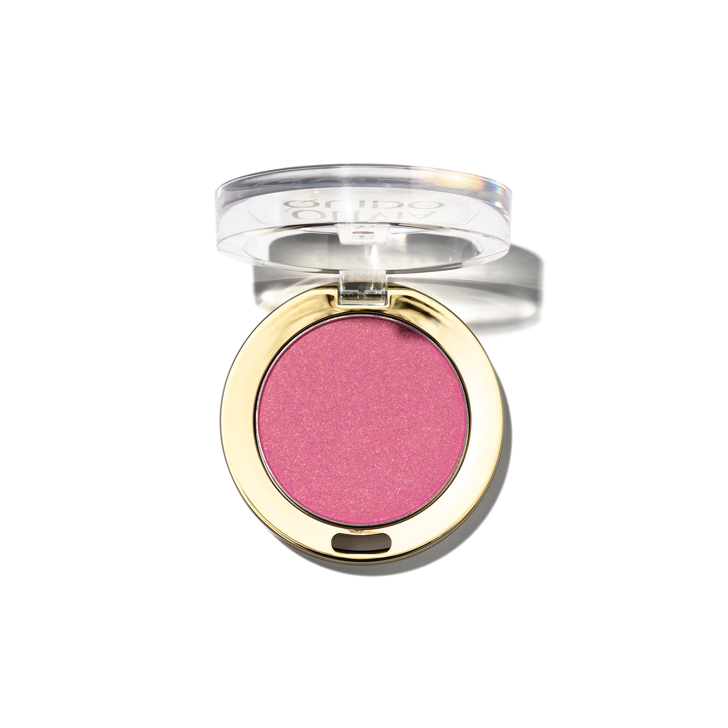 Olivia Quido Pressed Powder Blush in a compact, perfect pink shade for all skin tones, infused with pearlescent pigments.