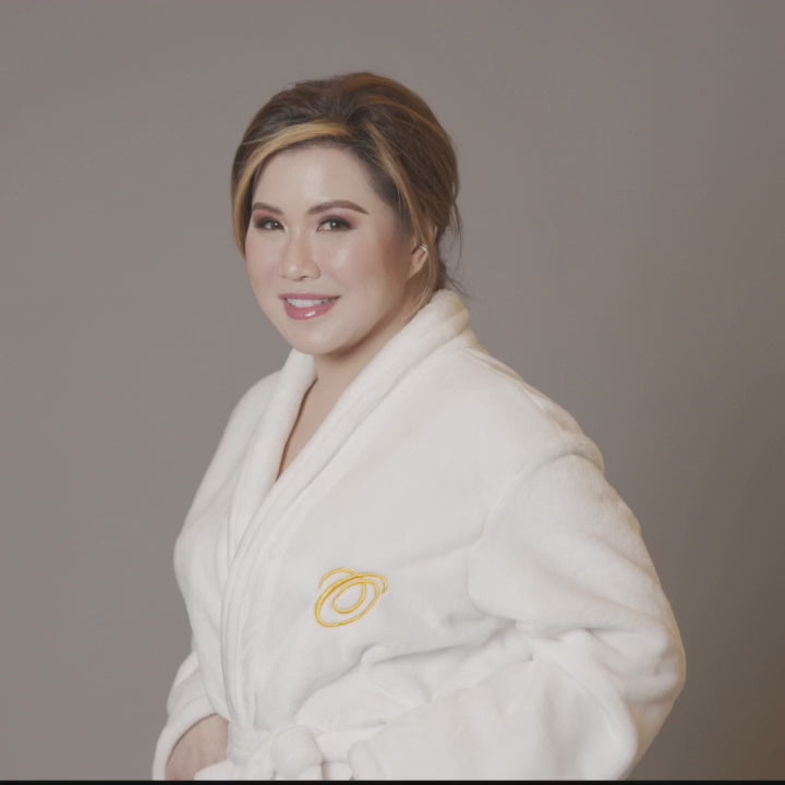 Olivia Quido wearing Luxury spa robe with logo