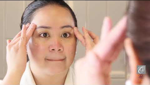 video of woman applying Olivia Quido Acne Benzoyl wash